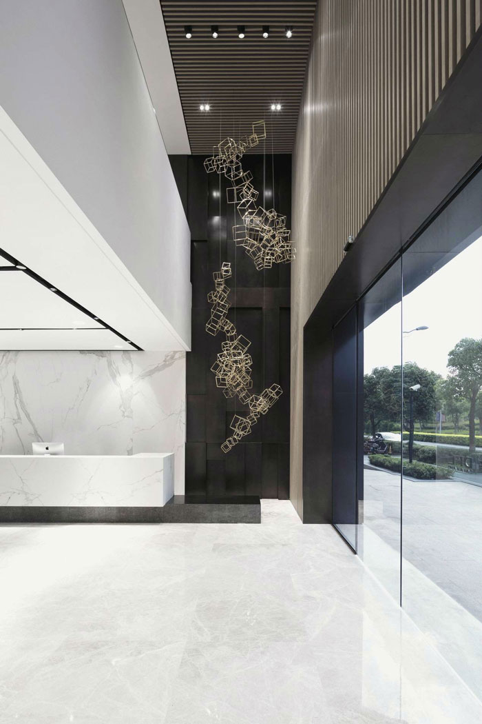 總部大樓辦公室前臺裝修設(shè)計效果圖