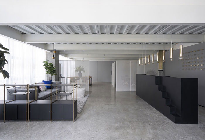 家居公司辦公室一樓前廳裝修設(shè)計效果圖