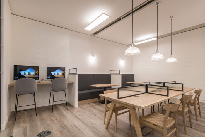 女裝公司辦公室辦公區(qū)裝修效果圖