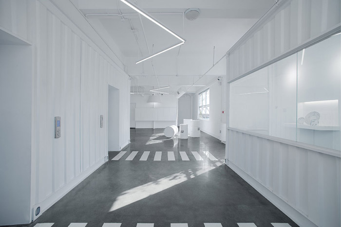 時(shí)尚創(chuàng)意工坊電梯口裝修效果圖