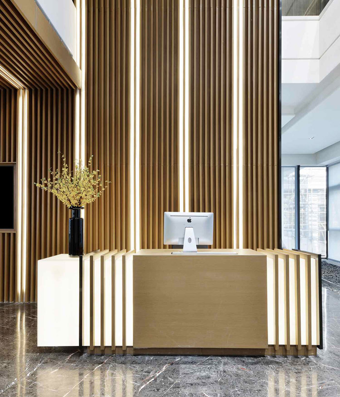 綠色環(huán)保辦公室前臺裝修設計效果圖